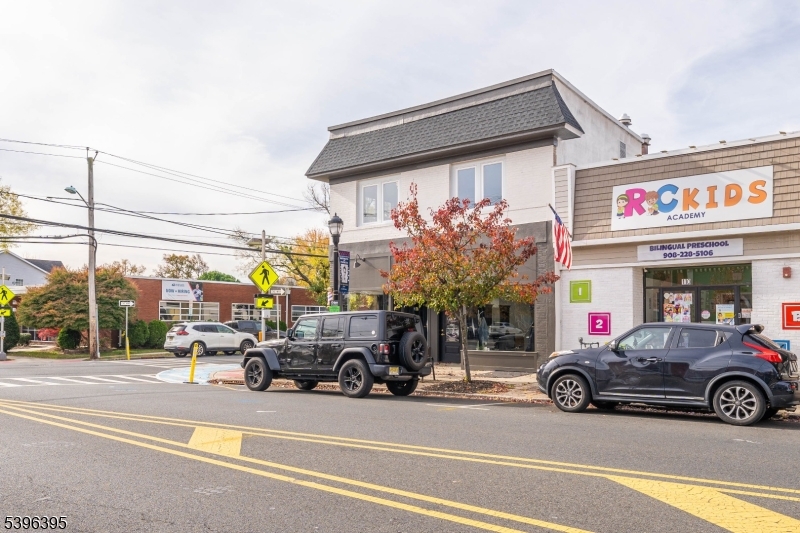 114 Center Street, Unit 2A Garwood, NJ 07027 - Photo 16 of 20 a view of a cars parked in front of a building