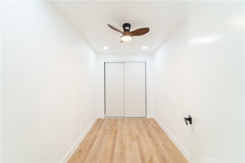 65125 Saturn Street Joshua Tree, CA 92252 - Photo 24 of 40 a view of empty room with wooden floor