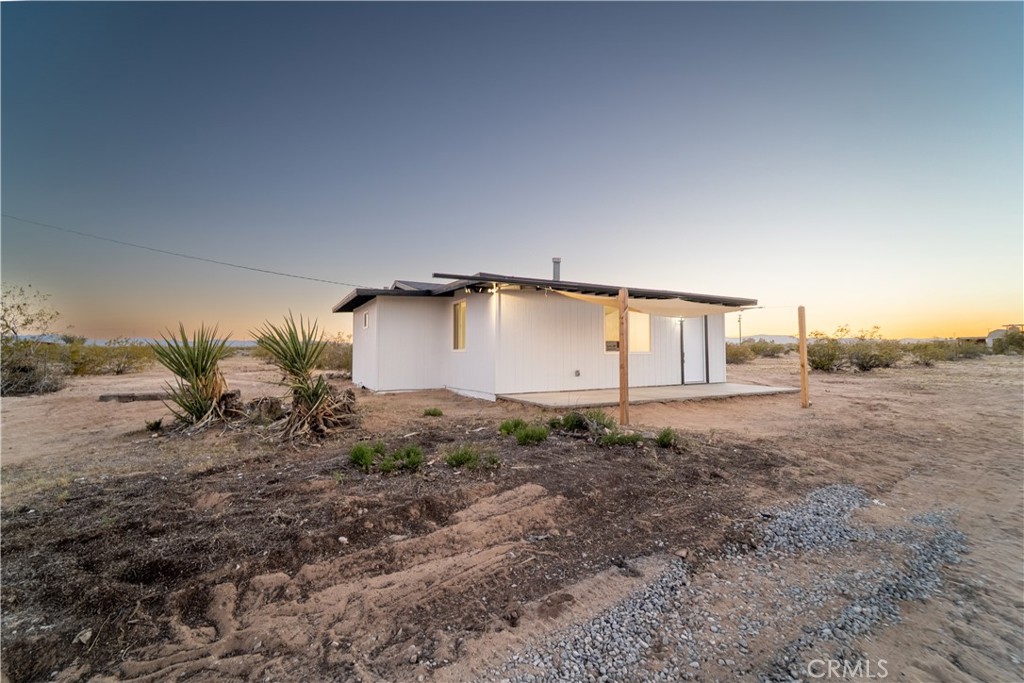 65125 Saturn Street Joshua Tree, CA 92252 - Photo 3 of 40 a house view with backyard space