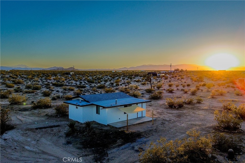 65125 Saturn Street Joshua Tree, CA 92252 - Photo 35 of 40 an aerial view of a house with a yard