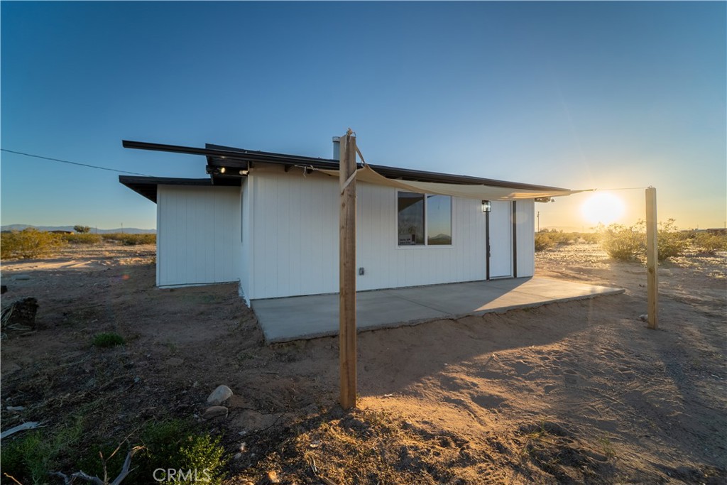 65125 Saturn Street Joshua Tree, CA 92252 - Photo 7 of 40 a house view with a backyard space