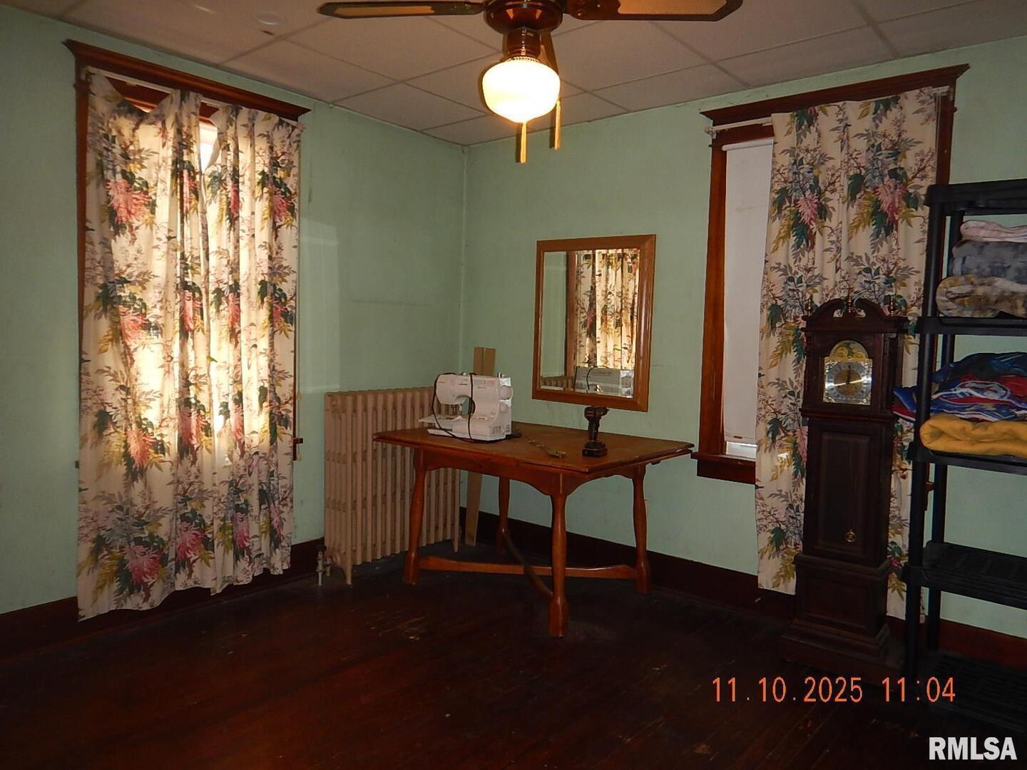 702 Elliott Street, Unit 1 Kewanee, IL 61443 - Photo 8 of 19 a view of a livingroom with furniture and window