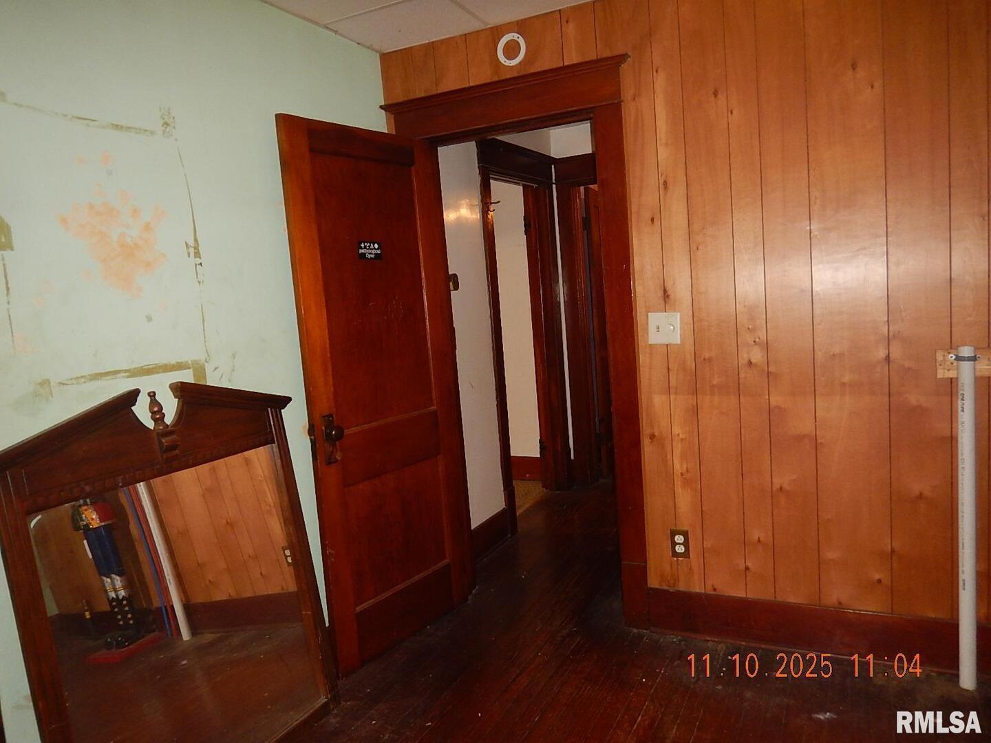 702 Elliott Street, Unit 1 Kewanee, IL 61443 - Photo 9 of 19 a view of front door with wooden door