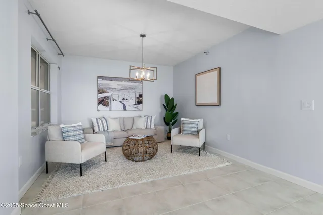 a white toilet sitting next to a shower