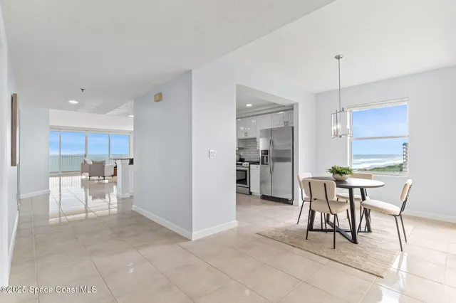 a bath tub sitting next to a white sink