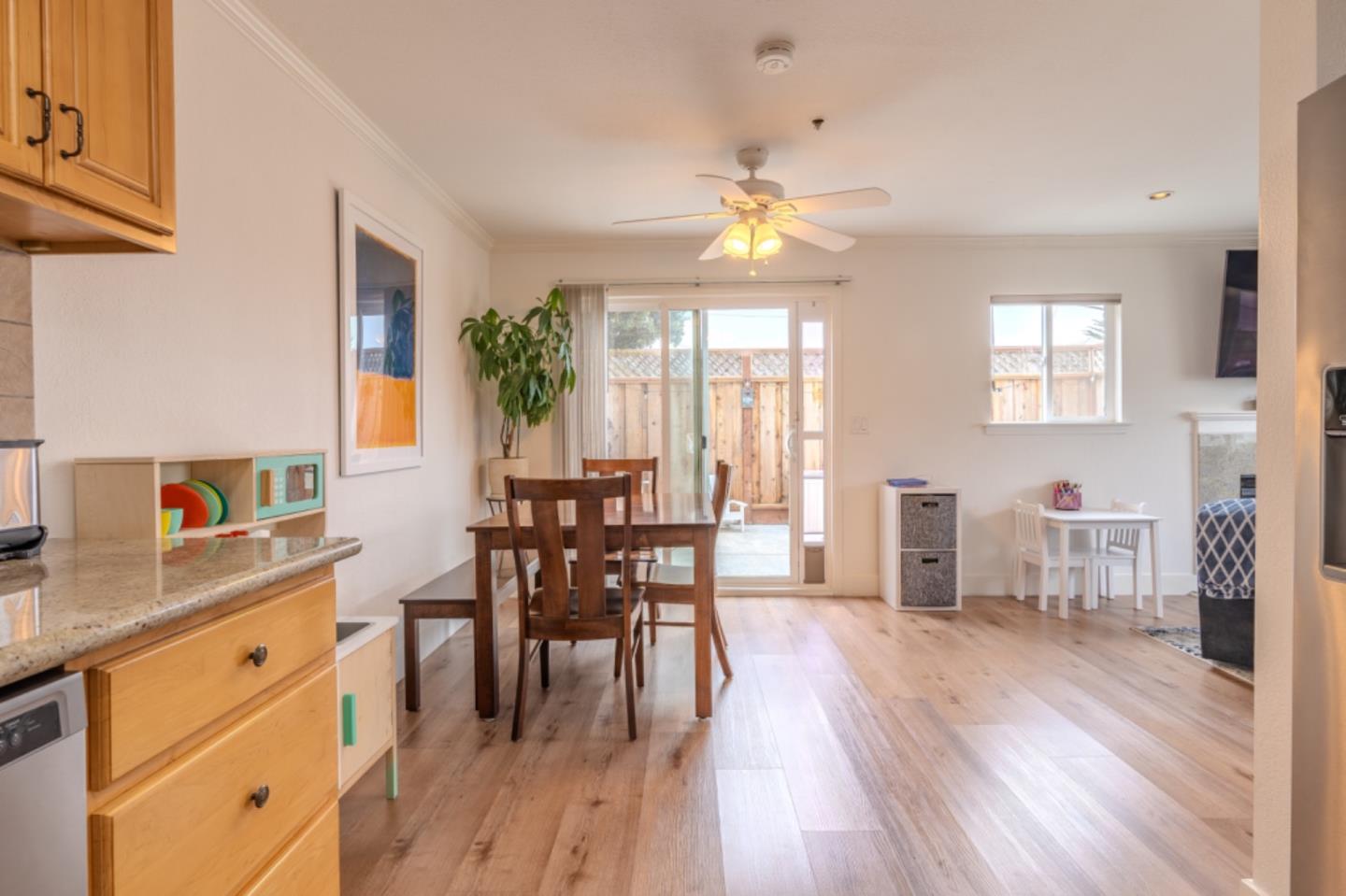209 Clifton Road Pacifica, CA 94044 - Photo 15 of 31 a view of a dining room with furniture and wooden floor