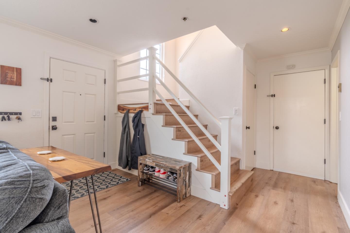 209 Clifton Road Pacifica, CA 94044 - Photo 20 of 31 a view of entryway with stairs and wooden floor