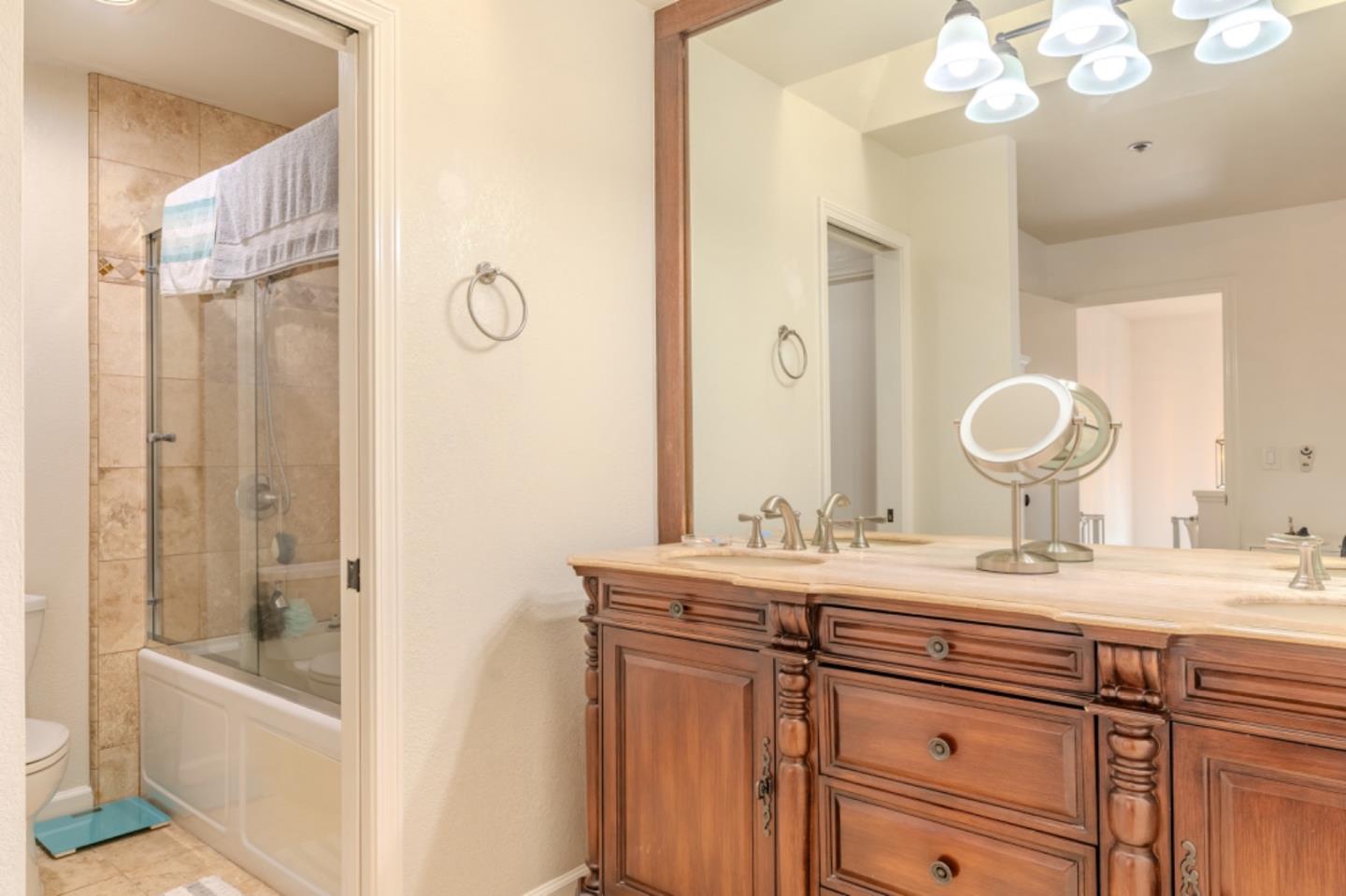 209 Clifton Road Pacifica, CA 94044 - Photo 24 of 31 a bathroom with a sink a vanity and a mirror