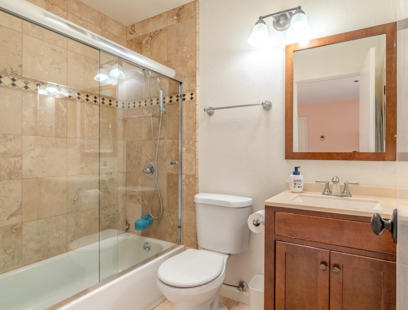 209 Clifton Road Pacifica, CA 94044 - Photo 28 of 31 a bathroom with a sink a toilet and shower