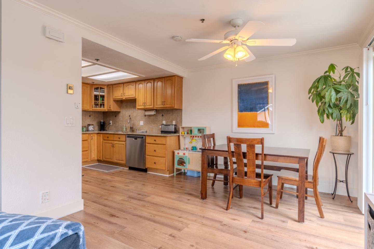 209 Clifton Road Pacifica, CA 94044 - Photo 10 of 31 a kitchen with a table chairs and entryway