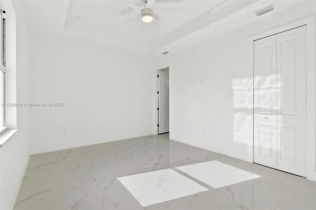 an empty room with an entryway