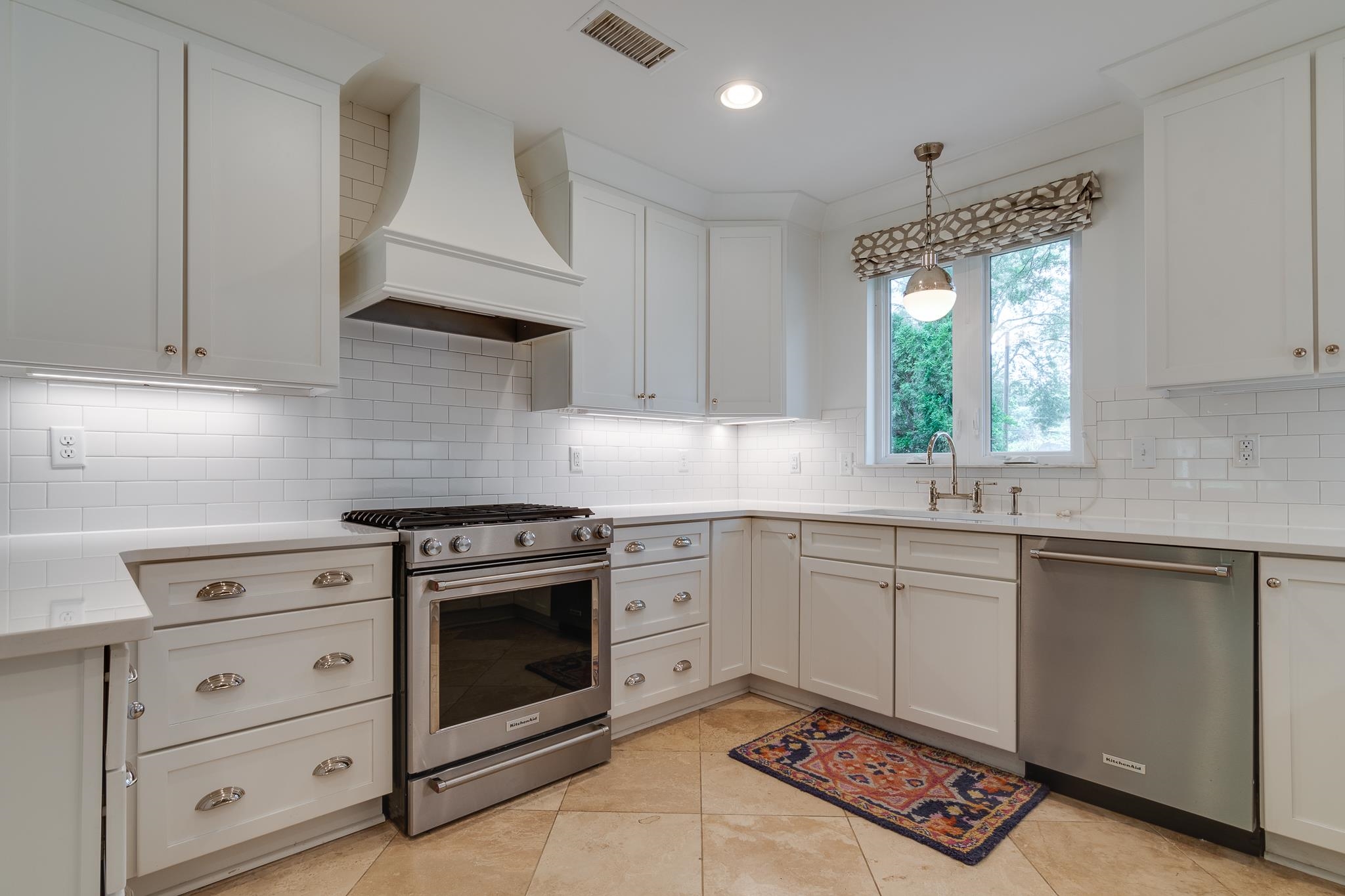 4501 Sequoia Road Memphis, TN 38117 - Photo 8 of 25 a kitchen with a stove sink and cabinets