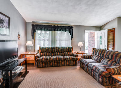 445 Deep Woods Road Hardy, VA 24101 - Photo 13 of 47 a living room with furniture and a flat screen tv