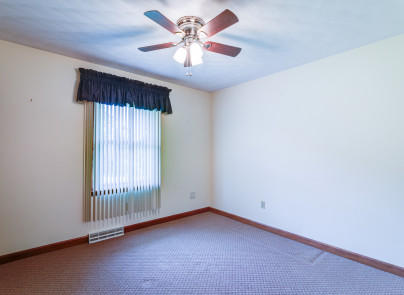 445 Deep Woods Road Hardy, VA 24101 - Photo 20 of 47 an empty room with windows and fan