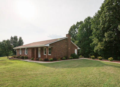 445 Deep Woods Road Hardy, VA 24101 - Photo 29 of 47 a view of a house with a yard and sitting area