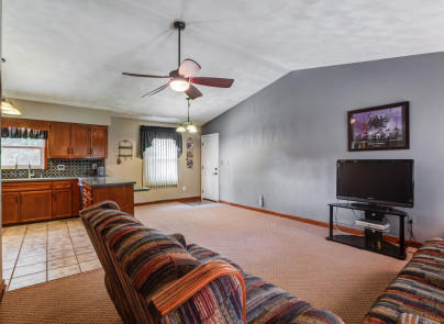 445 Deep Woods Road Hardy, VA 24101 - Photo 6 of 47 a bedroom with furniture and a flat screen tv