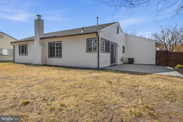 a house with yard in front of it