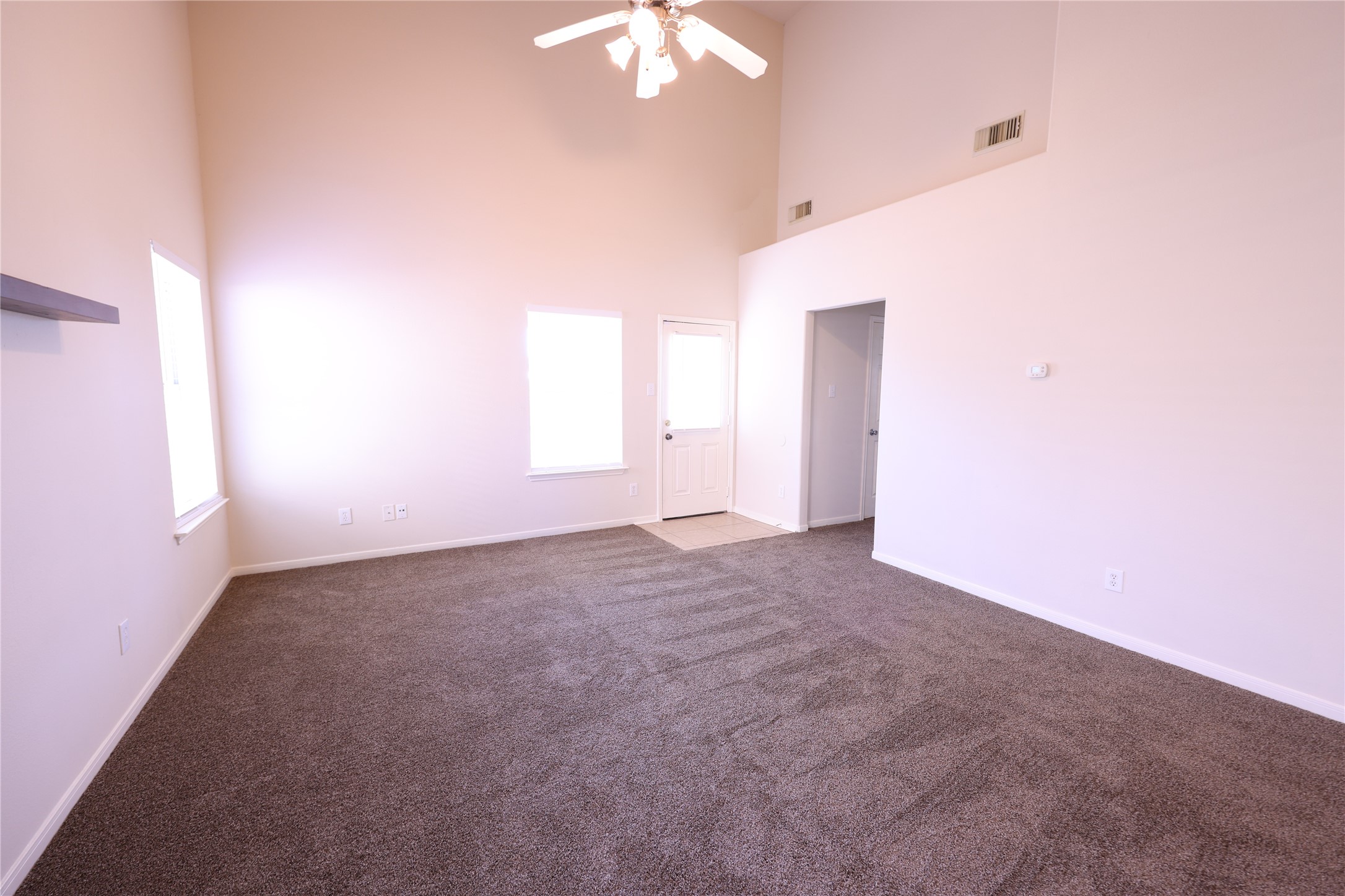 1007 Harrisburg Court Rosenberg, TX 77471 - Photo 11 of 24 a view of an empty room with a window