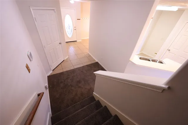 an empty room with wooden floor