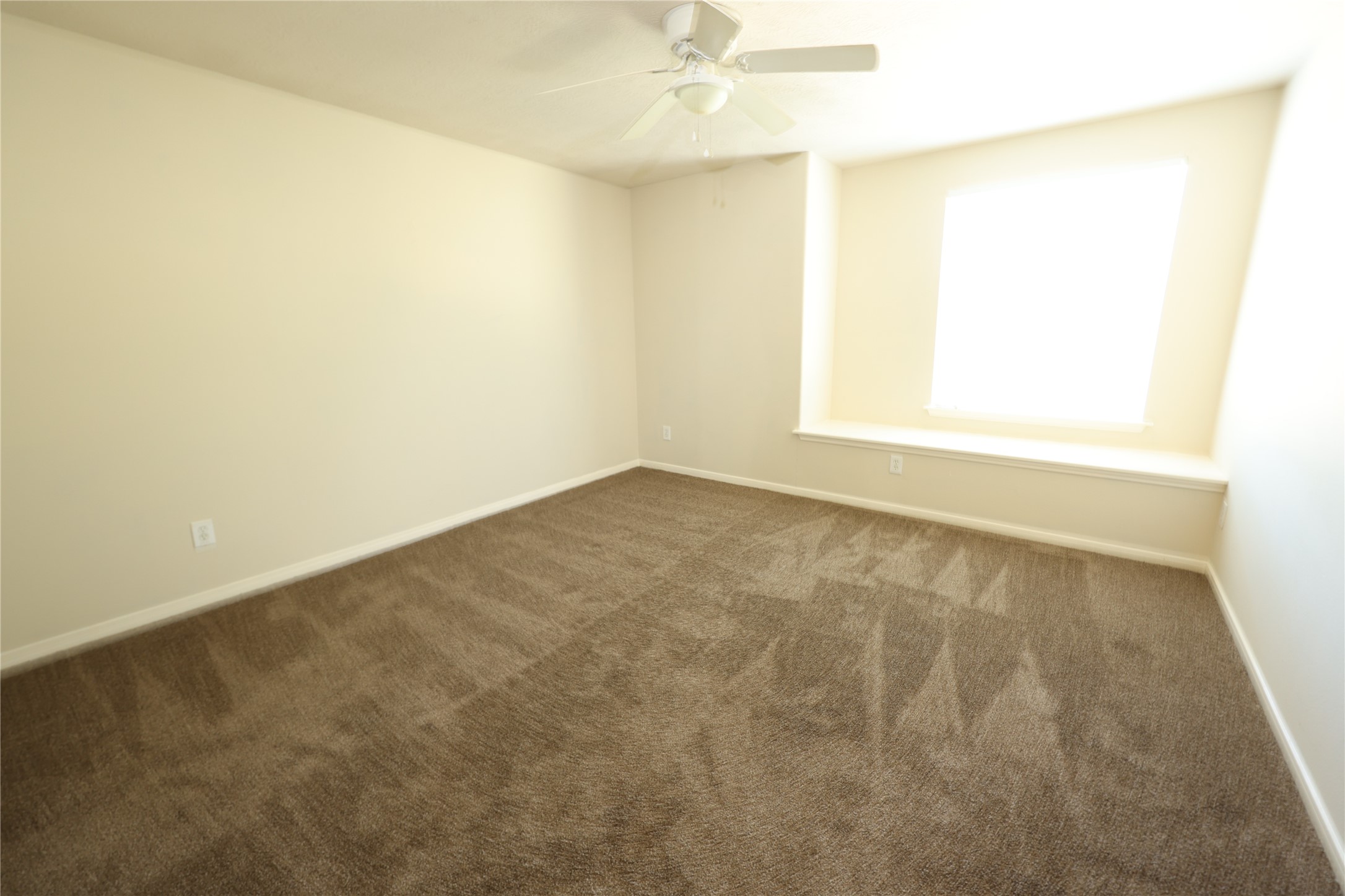 1007 Harrisburg Court Rosenberg, TX 77471 - Photo 20 of 24 an empty room with a window