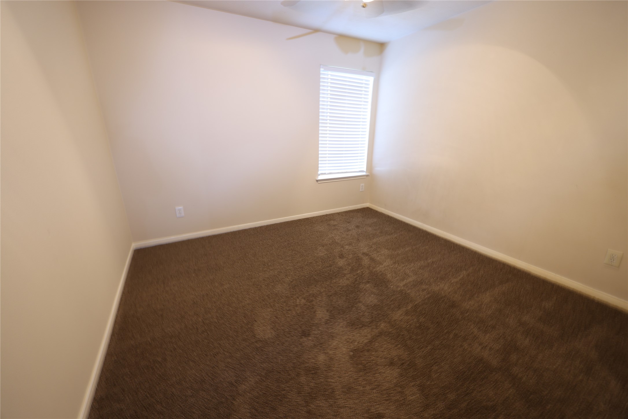 1007 Harrisburg Court Rosenberg, TX 77471 - Photo 21 of 24 an empty room with a window