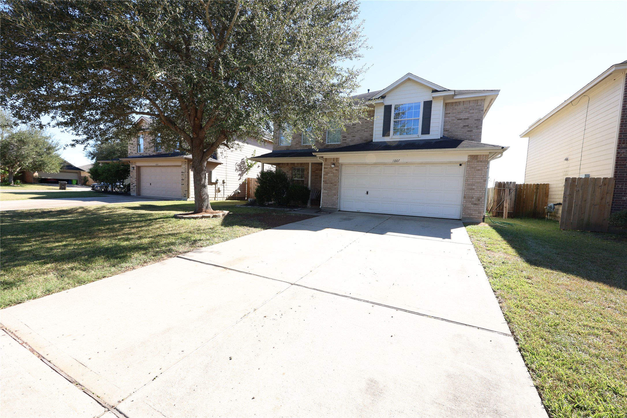 1007 Harrisburg Court Rosenberg, TX 77471 - Photo 4 of 24 a house view with a outdoor space