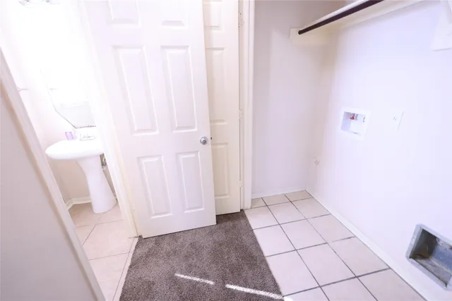 a view of a kitchen cabinets and a wooden floor