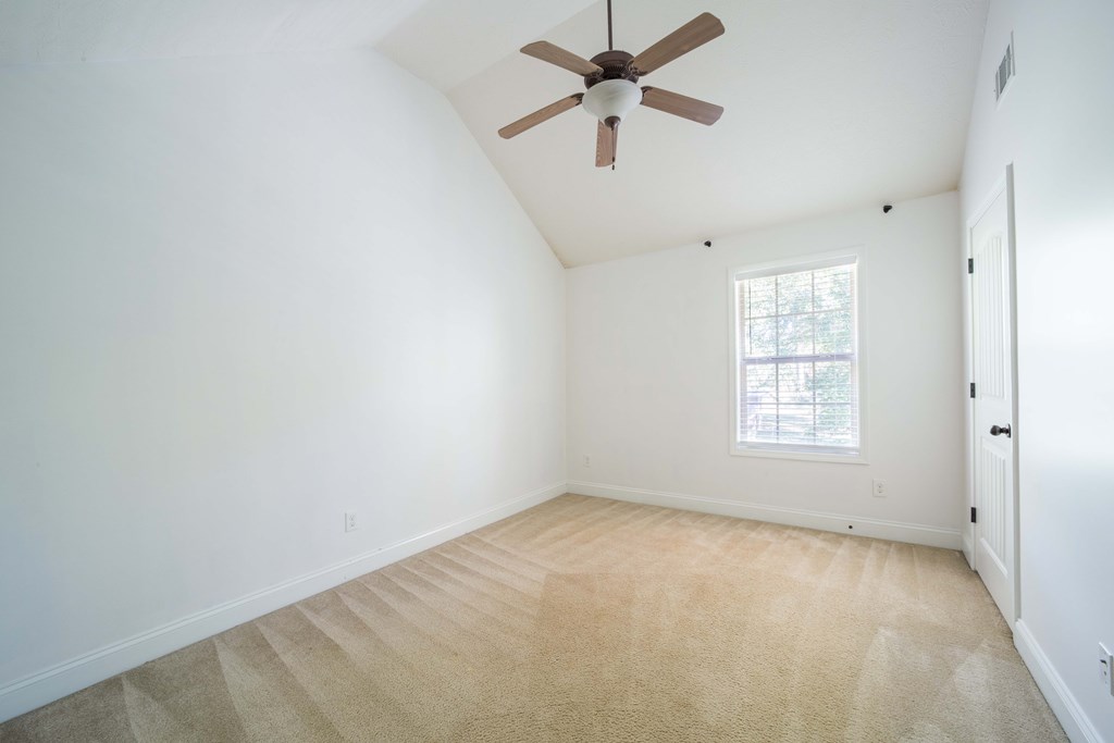 5151 Mccaghren Drive Columbus, GA 31909 - Photo 11 of 15 an empty room with a window and a fan