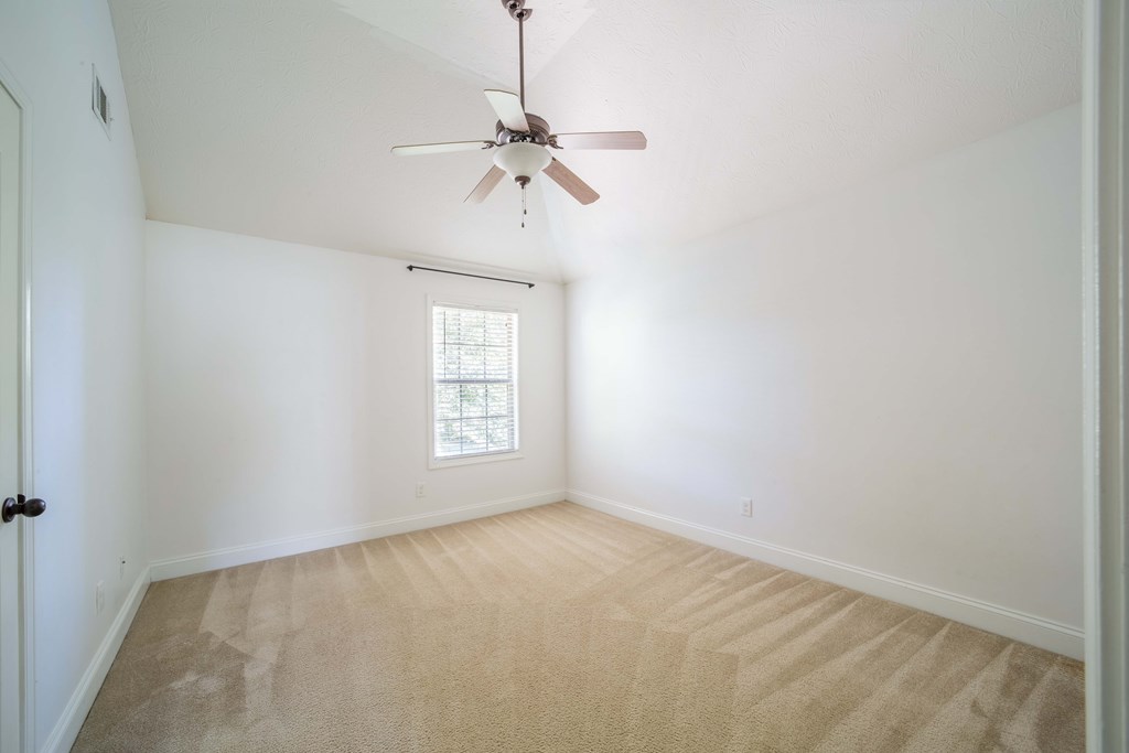 5151 Mccaghren Drive Columbus, GA 31909 - Photo 12 of 15 a view of an empty room with a window