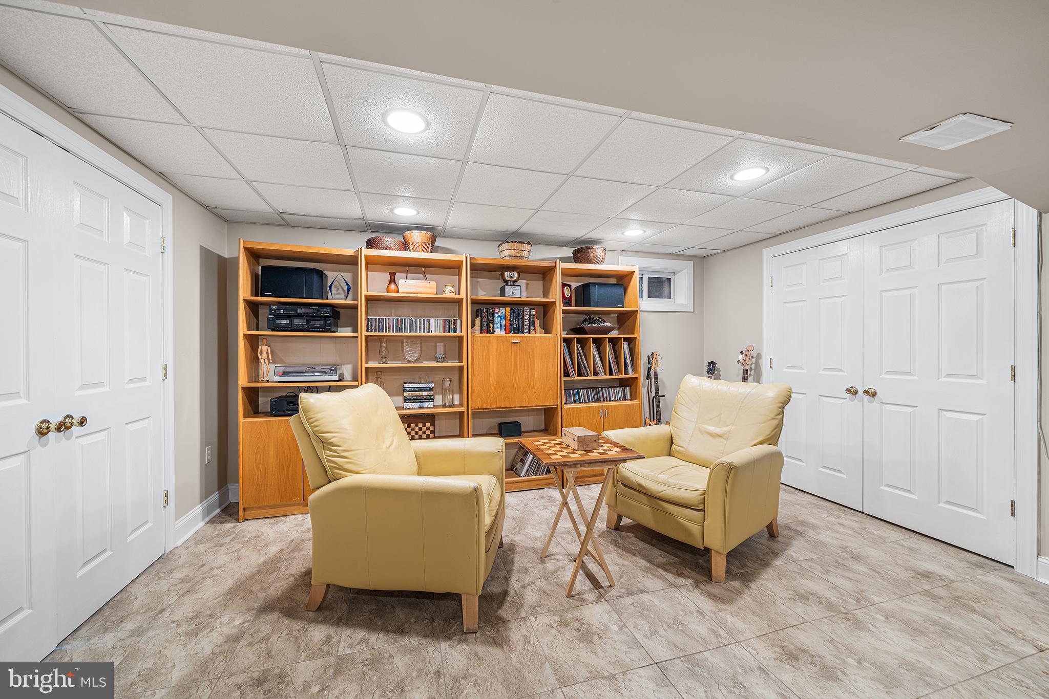 702 Brookhaven Road Wallingford, PA 19086 - Photo 28 of 31 a living room with furniture and a table