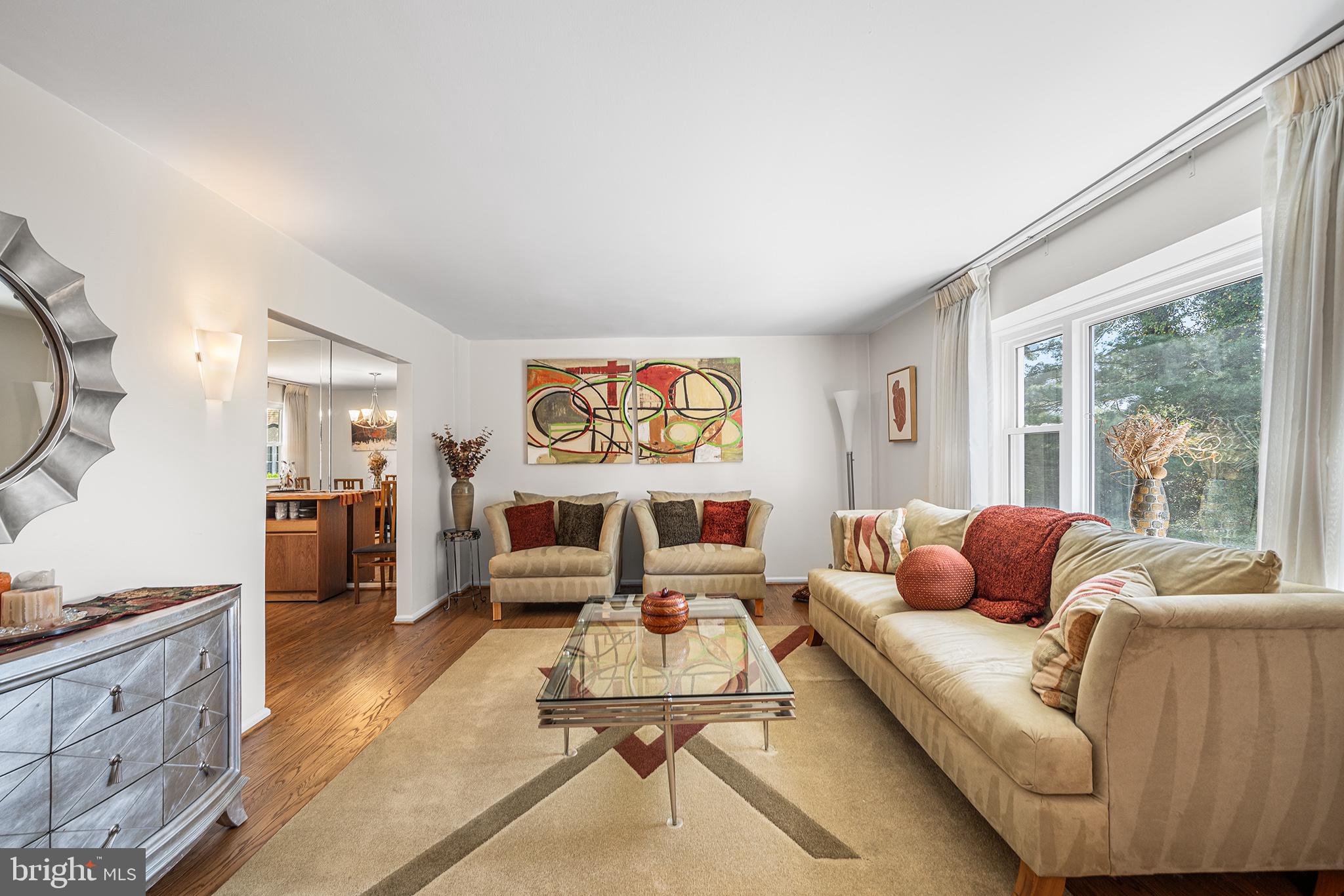 702 Brookhaven Road Wallingford, PA 19086 - Photo 7 of 31 a living room with furniture and a large window