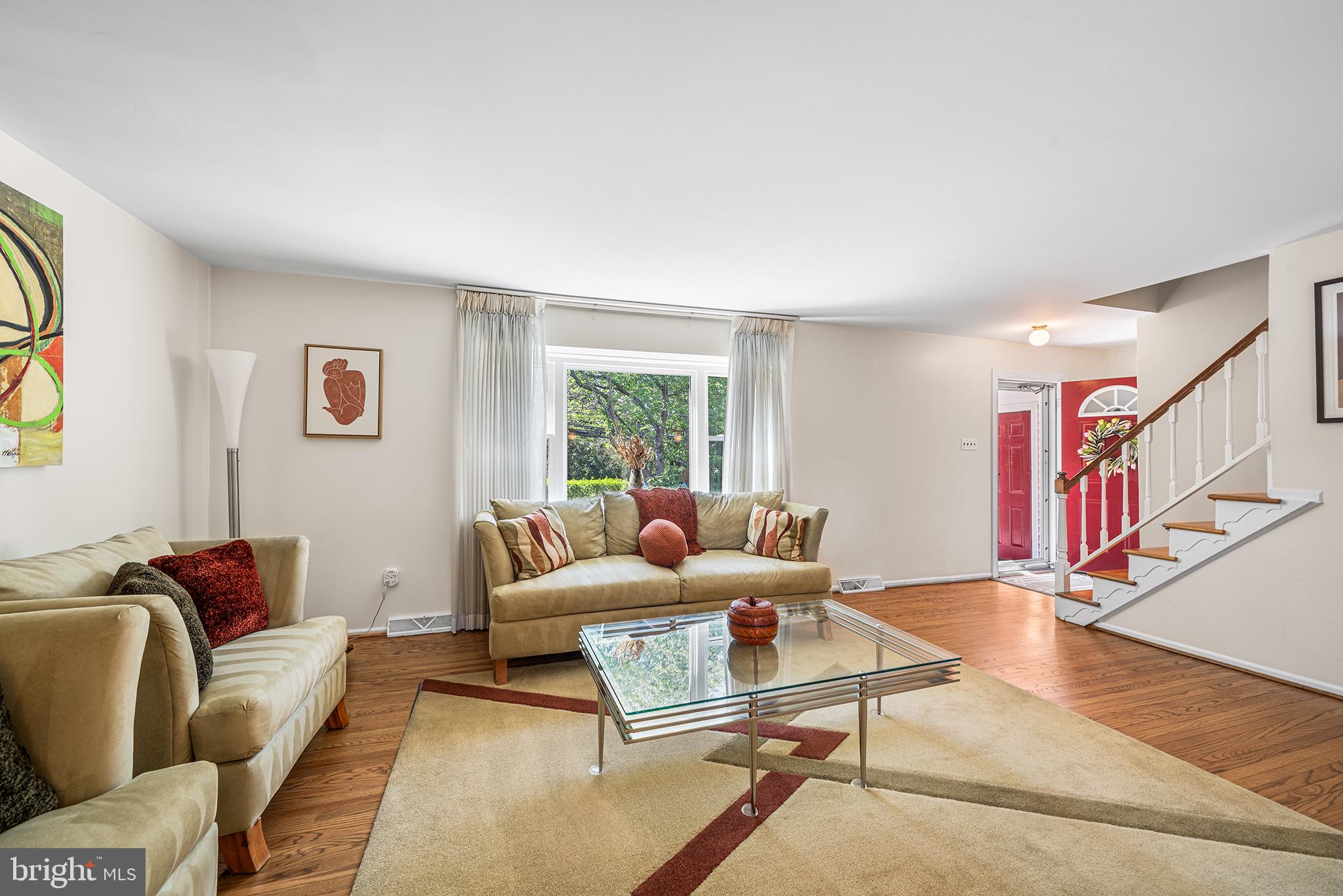 702 Brookhaven Road Wallingford, PA 19086 - Photo 8 of 31 a living room with furniture and a window