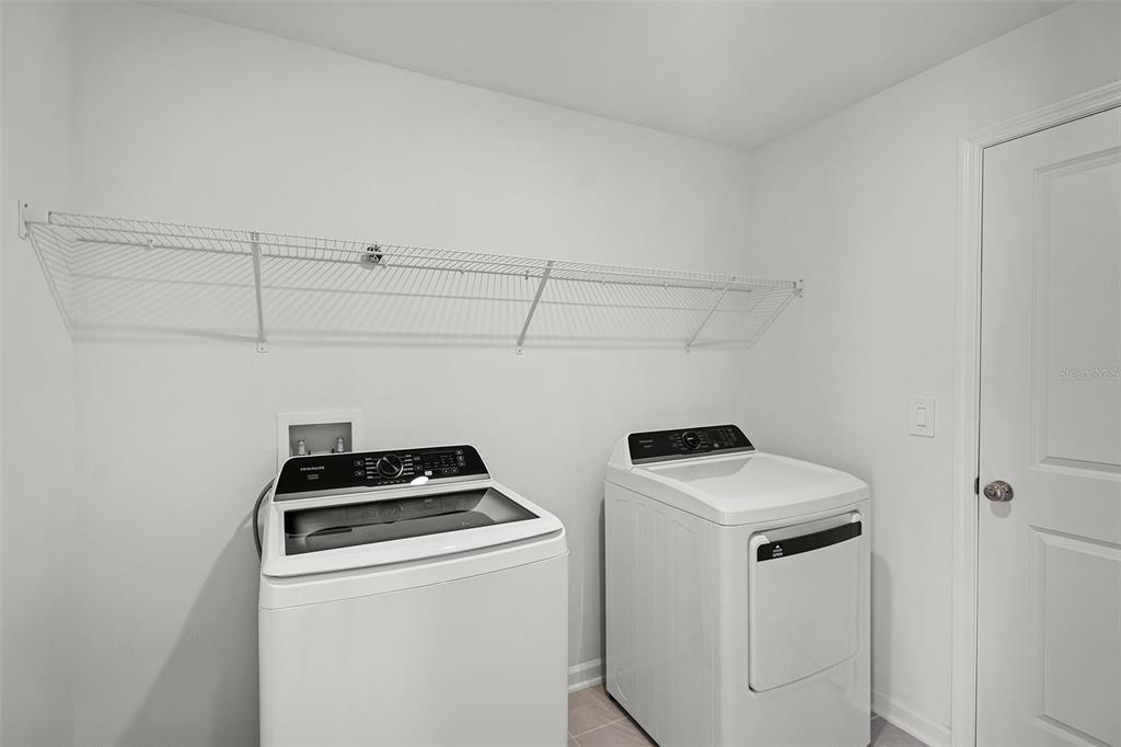 1993 Sarah Street Lake Wales, FL 33859 - Photo 18 of 31 a utility room with dryer and washer