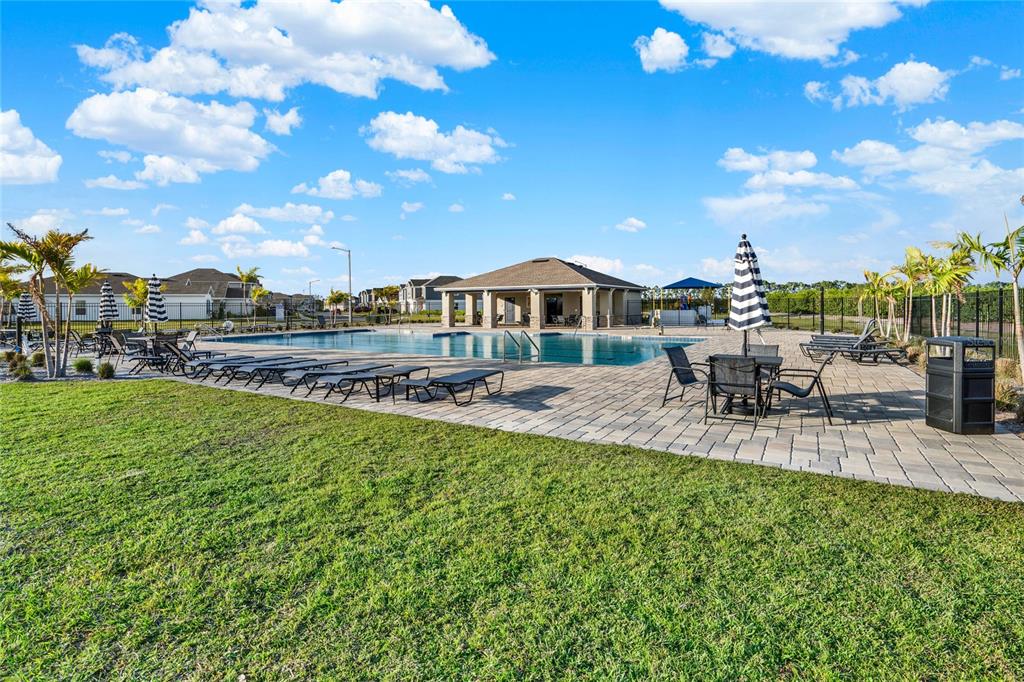 1993 Sarah Street Lake Wales, FL 33859 - Photo 26 of 31 a view of a house with a yard porch and sitting area
