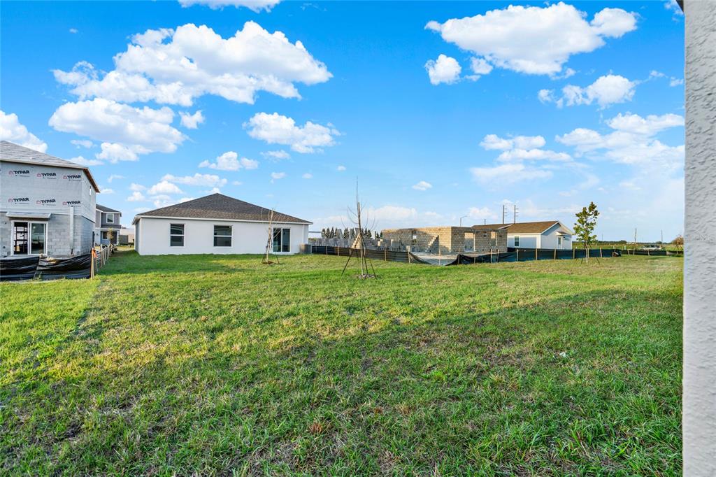 1993 Sarah Street Lake Wales, FL 33859 - Photo 27 of 31 a front view of a house with garden