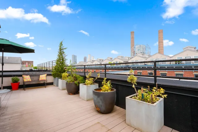 a view of a terrace with sitting area