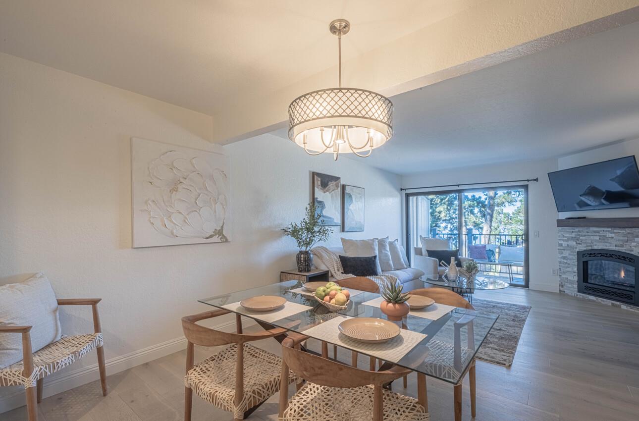 250 Forest Ridge Road, Unit 27 Monterey, CA 93940 - Photo 11 of 38 a view of a dining room with furniture window and wooden floor