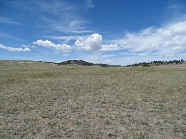 a view of a lake and mountain in the back