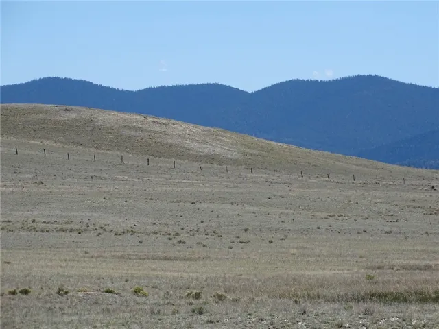 a view of a lake and mountain in the back