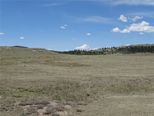 a view of ocean and mountain
