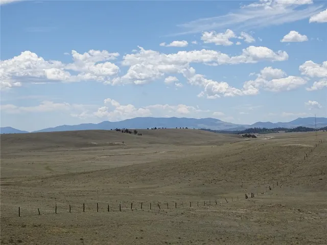 a view of a lake and mountain