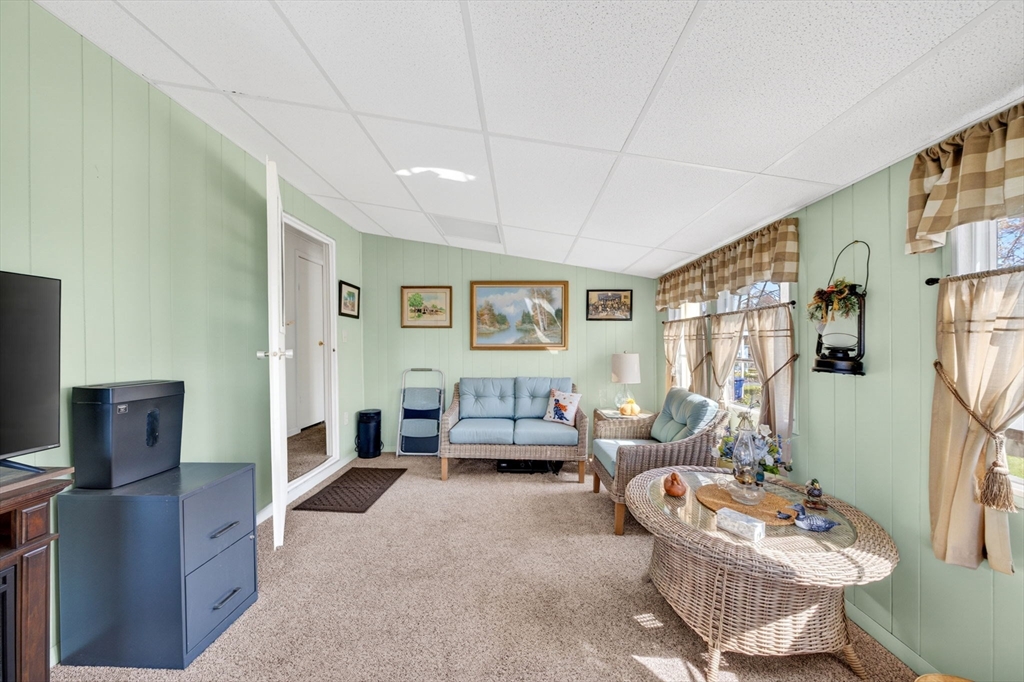 19 Timber Lane Wareham, MA 02571 - Photo 25 of 38 a living room with furniture and a flat screen tv