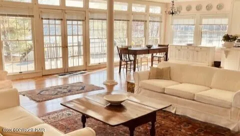 a view of a dry yard with wooden fence