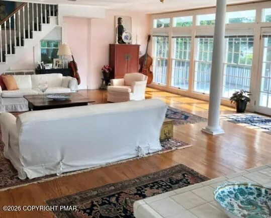 a backyard of a house with lots of green space and a fountain