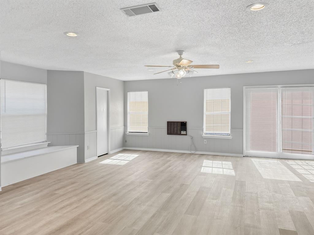 2308 Winterstone Drive Plano, TX 75023 - Photo 4 of 16 a view of an empty room with a window