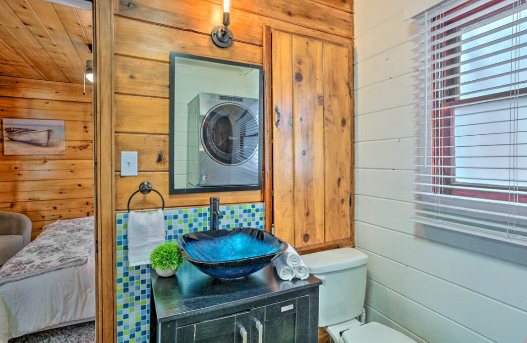 42036 Tollhouse Road Shaver Lake, CA 93664 - Photo 16 of 30 a bathroom with a sink and a mirror