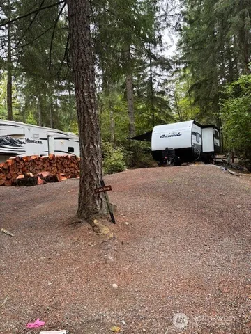 a view of a car parked in front of a house