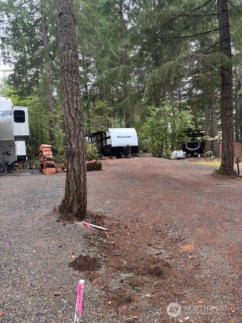 1546 Reservation Road Southeast, Unit 9 Olympia, WA 98513 - Photo 3 of 19 a car parked in front of a house