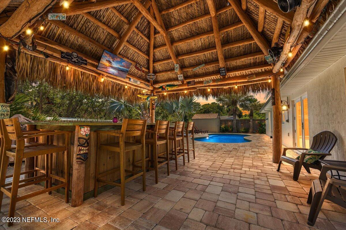 a view of a chairs room with wooden roof