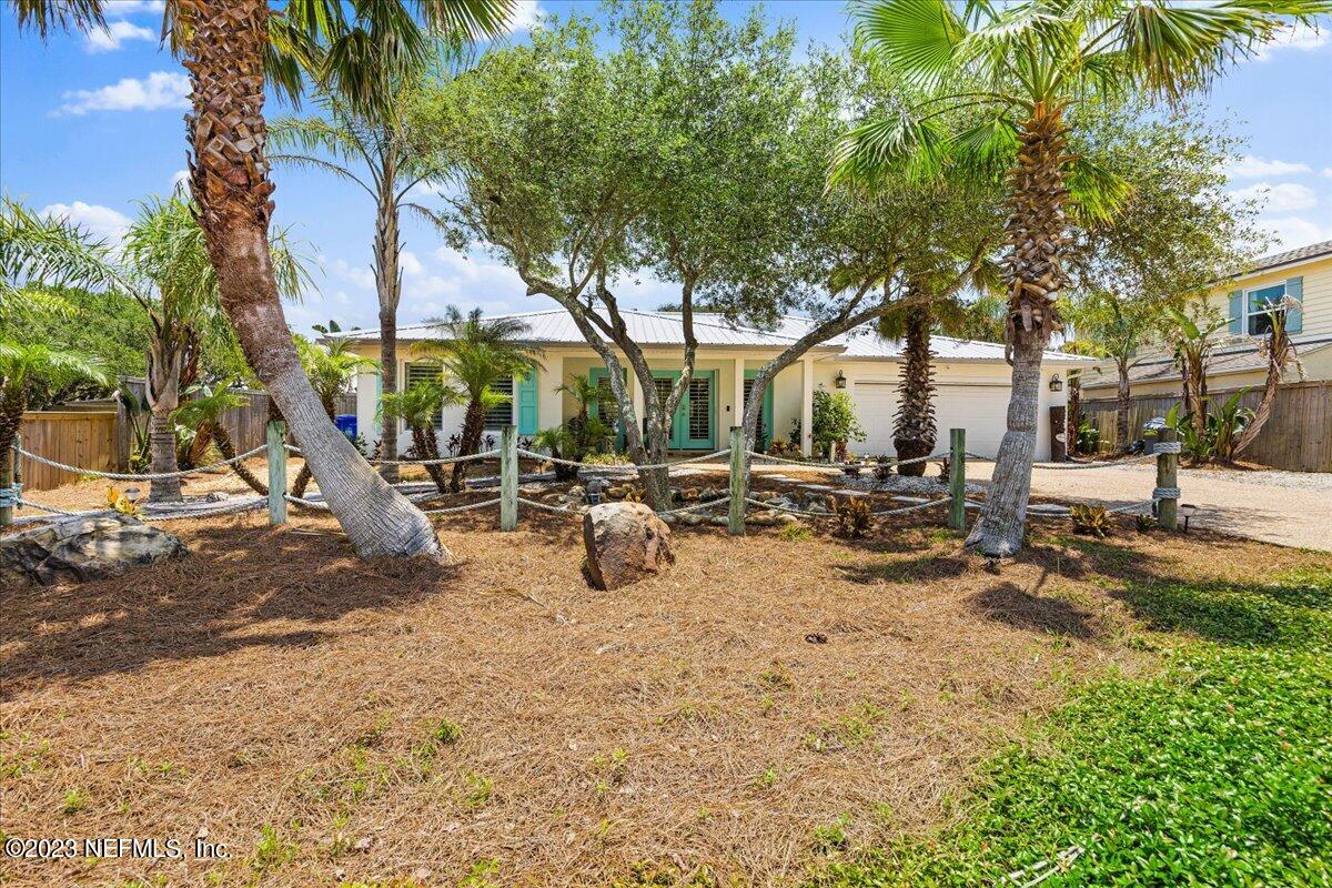 313 Eleventh Street St. Augustine, FL 32084 - Photo 6 of 35 a view of a park with bench and trees